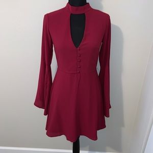 Maroon dress with long sleeves and front buttons